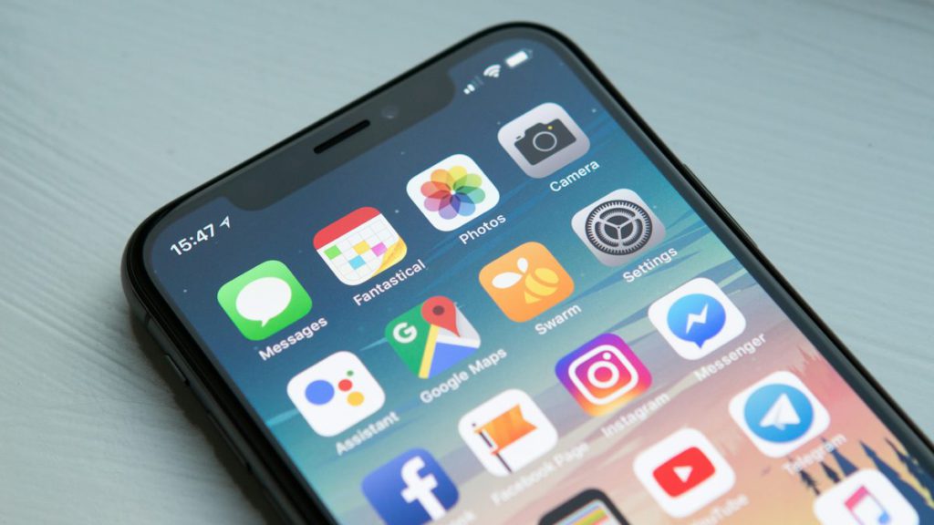 How to get my business on Google Maps – smartphone in hand searching for local businesses