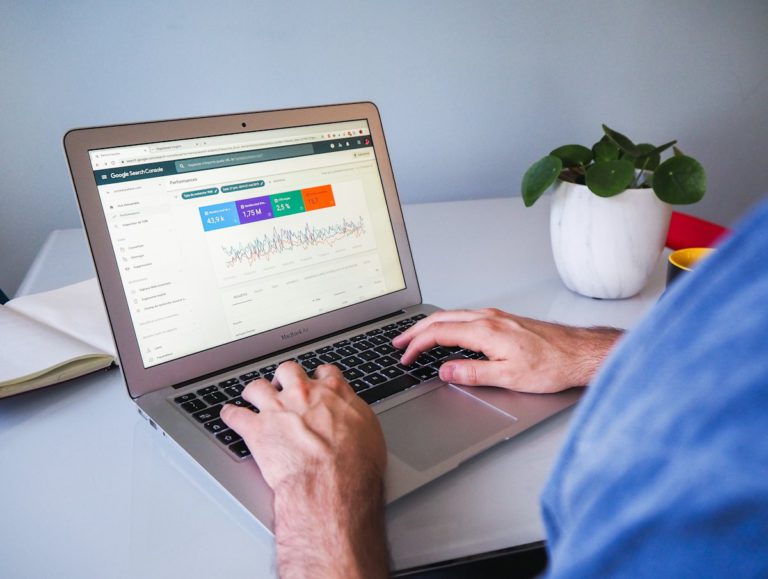 SEO specialist running a technical SEO audit on a laptop for a Dhaka business website