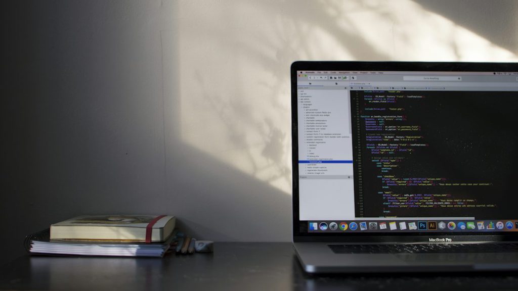 Website not ranking on Google – developer auditing website code on a laptop